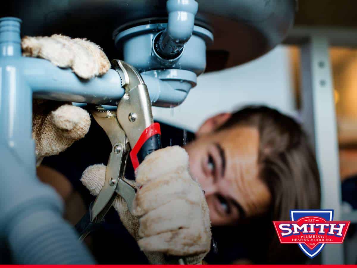 A plumber Replacing Plumbing Fixtures